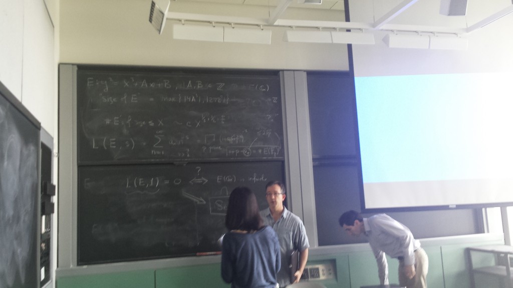 Prof. Skinner with students after a lecture on number theory and things